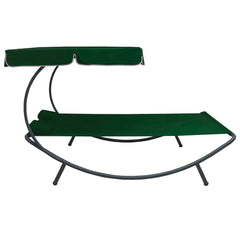 Sunbed with canopy and pillows green