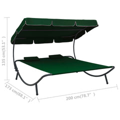 Sunbed with canopy and pillows green